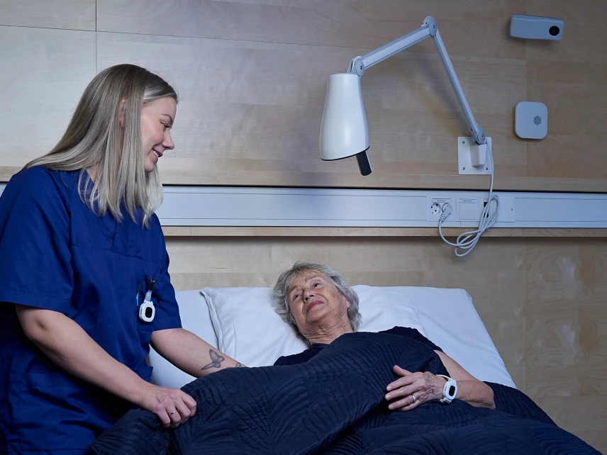 Healthcare worker assisting a patient
